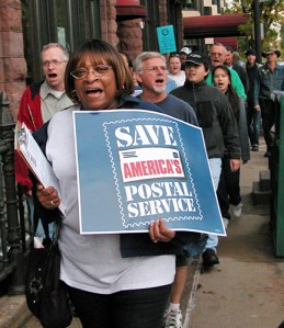Demonstrators marched in St. Paul during a "Save Our Postal Service" rally on Cathedral Hill last year.