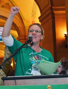 Lisa Thompson, president of Child Care Providers Together, an AFSCME Council 5 local, fires up the crowd in the Capitol rotunda during Council 5’s annual lobbying day Feb. 26.