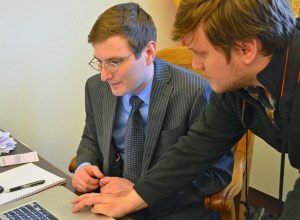 Metsa and Working America organizer Chase Brandau search online for rental housing that would be affordable for a minimum-wage earner.