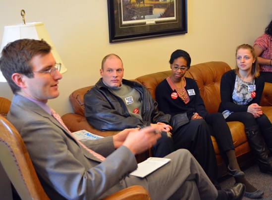 Rep. Jason Metsa hears from minimum-wage earners (L to R) Robert Schiff, Janiece Watts and Avita Samuels. 