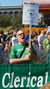 Randy Brooks, a library worker at the U of M and members of AFSCME Local 3937, joins the rally for affordable health care.