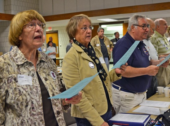 Union retirees open their 17th convention with a singing of "America the Beautiful" at the Sheet Metal Workers Hall in Maplewood.