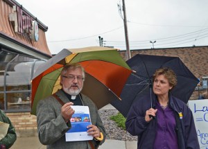 Rev. Grant Stevensen and SEIU Local 284 Executive Director Carol Nieters speak to activists outside a Wendy's in Minneapolis.