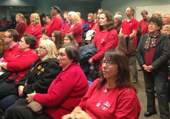 St. Paul teachers and their supporters deliver a petition to the school board in support of their core bargaining principles.