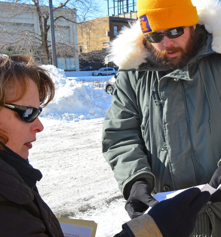 CWA members deliver a letter to Klobuchar's office urging her to take a stand against Fast Track trade authorization.
