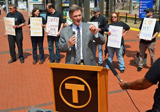 Metro Transit GM Brian Lamb speaks during the "Transit Tuesday" rally, which took place next to the Government Plaza light-rail stop.