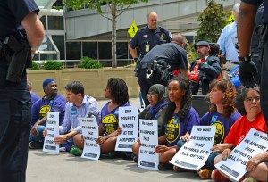 Police arrest Darrell Paulsen, a leader in the disability-rights organization ADAPT.