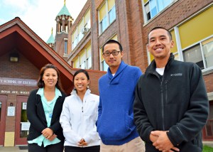 Fourth-grade teacher Bong Xiong, second from right, was active in efforts to organize a staff union at CSE. He was fired over the winter break. 