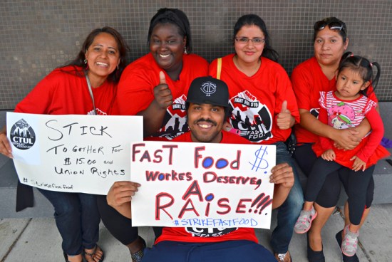 Striking workers from the Uptown McDonald's include (L to R) Eneida Jaimes, Nakia Joseph, Guillermo Lindsay, Tarcila Cruz and Maritza Vidal, with Jayleen Mendez.