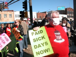 Activists in St. Paul rallied in 2008 in support of expanding workers' access to paid sick time.