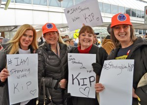 Pro-union Delta flight attendants based at Minneapolis-St. Paul International Airport joined a rally last month in support of fired Delta baggage handler Kip Hedges: (L to R) Julianna Helminski, Laurie Gandrud, Dotty Malinsky and Tammy Rustad.
