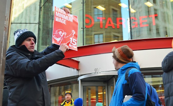Demonstrators march outside Target's headquarters on Nicollet Mall.