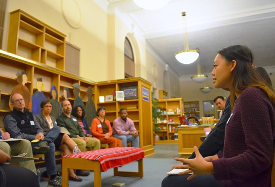 Maddy Lee, a senior at Harding High School in St. Paul, asks candidates for school board a question about the district’s discipline policies during a forum at the East Side Freedom Library. St.  Paul Federation of Teachers Local 28 sponsored the event, attended by all four labor-endorsed candidates for the board: (L to R) Jon Schumacher, Mary Vanderwert, Steve Marchese and Zuki Ellis. 