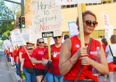 Nurses and supporters picketed outside United Hospital in St. Paul.