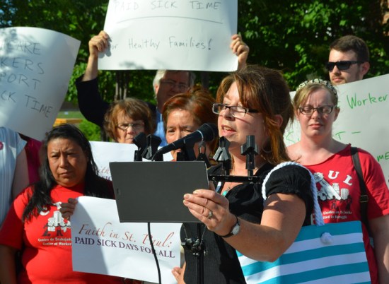 St. Paul business owner Diane Brennan speaks in support of a citywide earned sick time policy at a press conference before a public hearing on the issue.