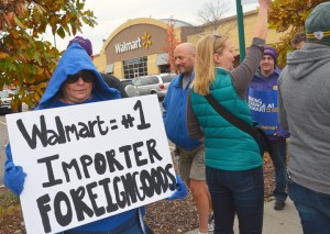 Tami Denn-Bauer, a representative with UFCW Local 1189, calls out Trump and Walmart for hawking foreign-made goods.