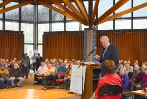 U.S. Rep. Rick Nolan checked a fact with pension attorney Ann Curry Thompson while addressing retirees Dec. 3.