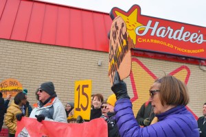 Opponents of Andy Puzder's nomination to lead the Labor department rallied outside Hardee's in St. Paul.