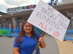 Roxy Hoda holding a picket sign outside Target Field